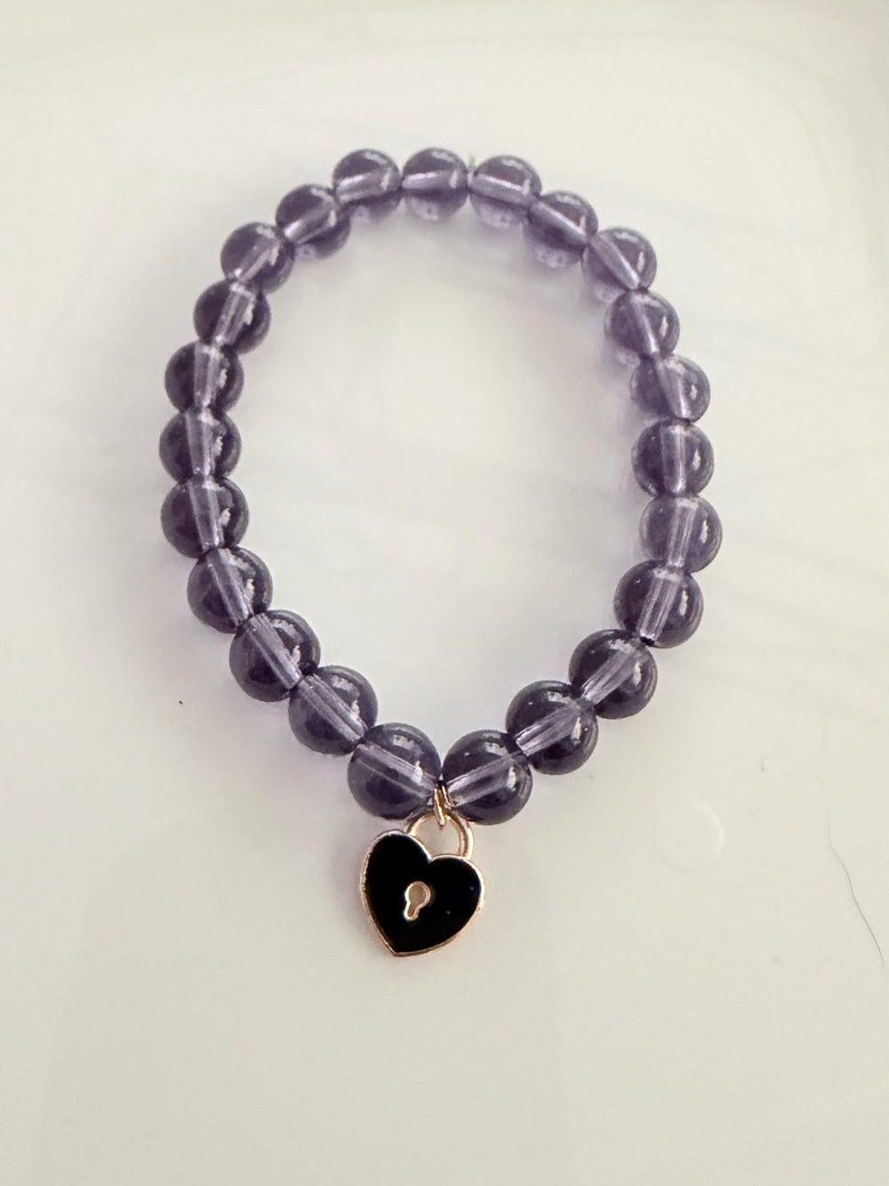 Purple Beaded Bracelet with Gold Heart Lock Charm